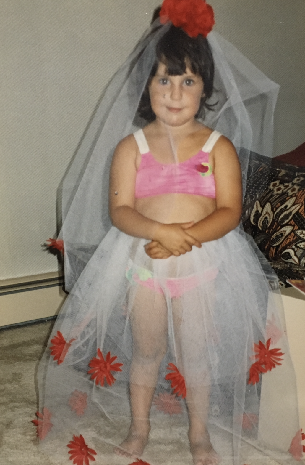 Gita as a young girl in a handmade dress